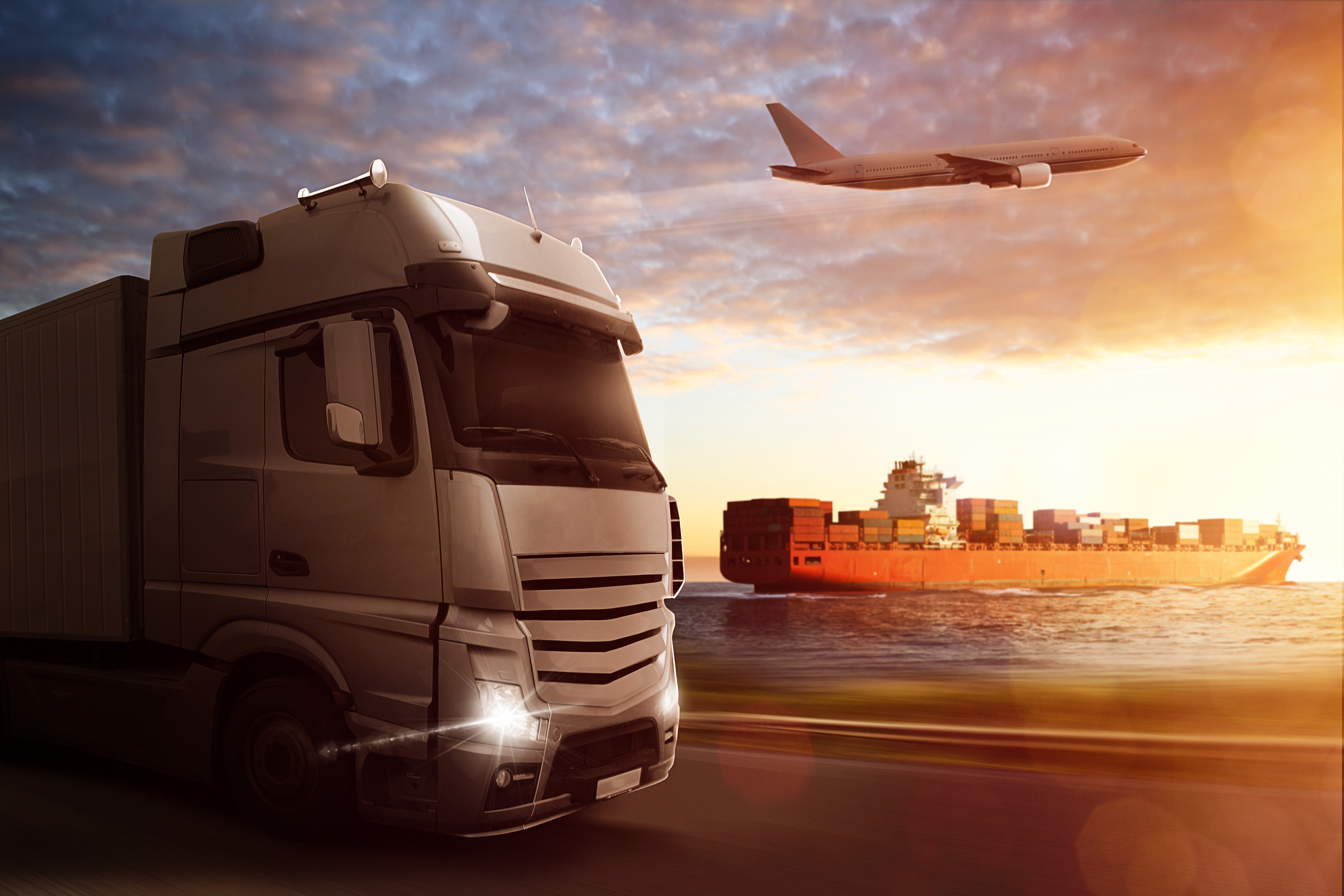 Container ship, cargo truck and aircraft illustrating international freight transport and logistics.